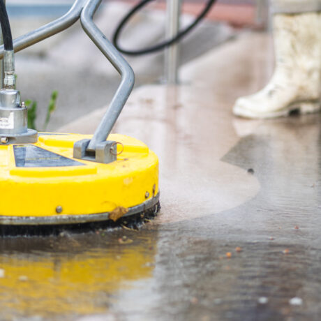 Pressure washing sidewalk